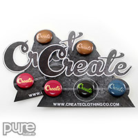 Custom Button Packs for Create Clothing Co with an Extreme Die Cut Shape and Four Pin-Back Buttons